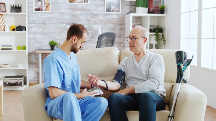 A male nurse providing healthcare in a nursing home