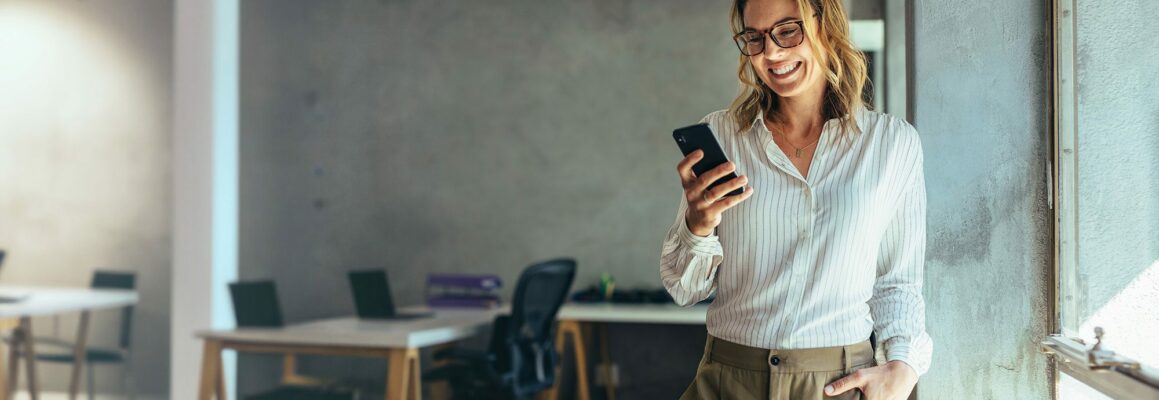 Woman looking at desk booking app